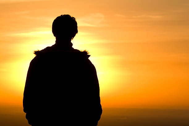istock Silhouette man sunrise morning 121271527