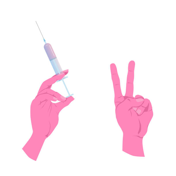 istock Salvation from Covid 19. Developed vaccine to defeat coronavirus. Hands with syringe and with a victory sign closeup 1212715763