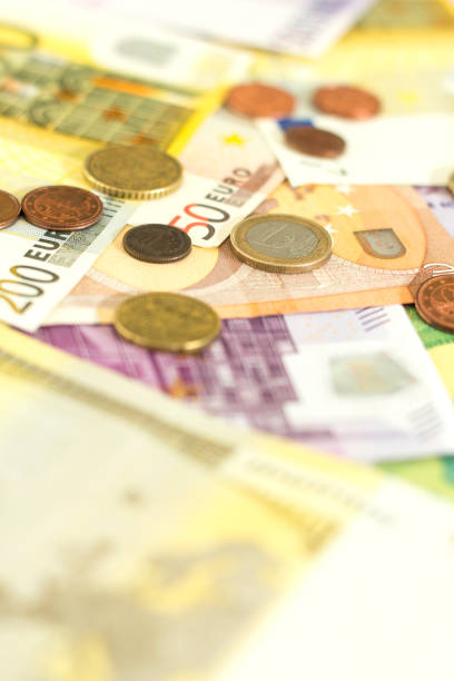 istock Euro banknotes and coins 1212717567