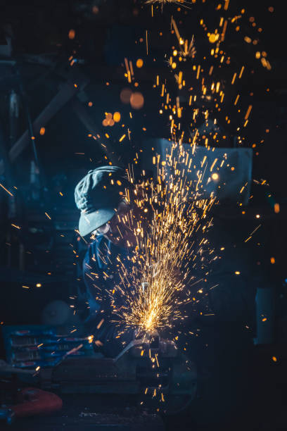 istock Grinding with Sparks Flying at Camera 1212718117