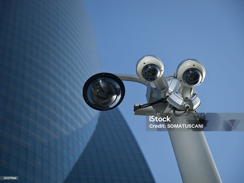 Security Cameras Security Cameras in a business area Building Exterior Stock Photo