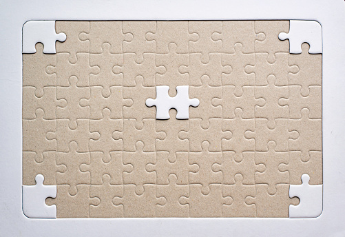 Blank white jigsaw puzzle background