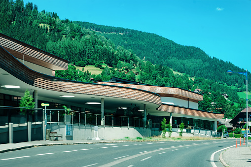 Street view on Thermal spa resort building in Bad Kleinkirchheim in Austria. Architecture on green background. Travel and vacation in Summer. Luxury house. Landscape and landmark.