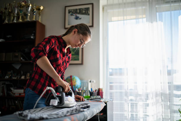 Teenage girl ironing clothes at home Teenage girl is ironing clothes at home.
Nikon D850 iron laundry cleaning ironing board stock pictures, royalty-free photos & images