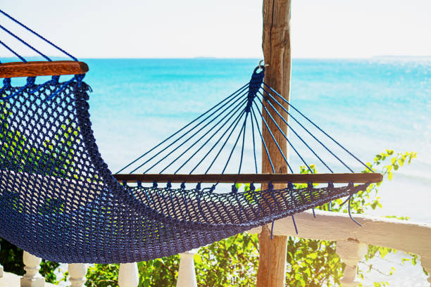 istock Relaxing in the classic blue color hammock. 1212735361