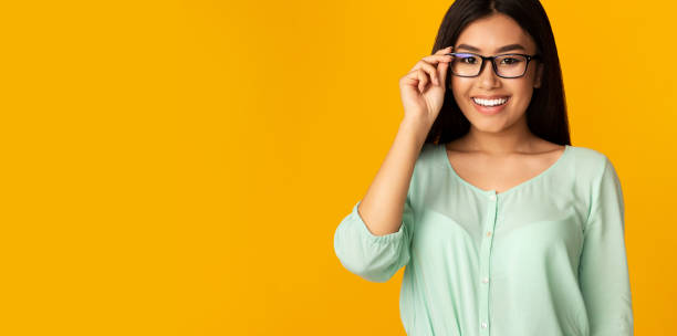 istock Girl In Eyewear Smiling To Camera Posing In Studio, Panorama 1212739787