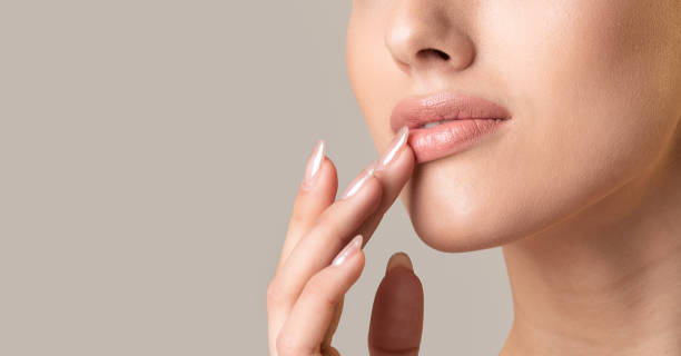 istock Unrecognizable Girl Touching Lips Over Beige Studio Background, Panorama, Cropped 1212740123