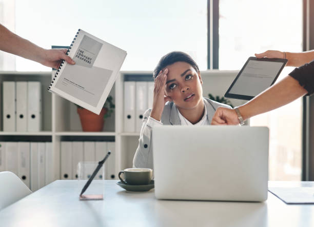 istock Business can sometimes be one headache after the other 1212740220