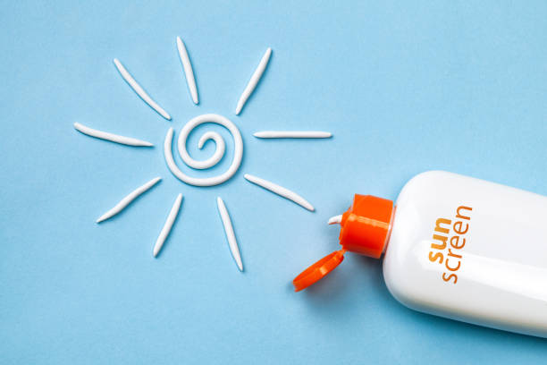 istock Sunscreen. Cream in the form of sun 1212740580