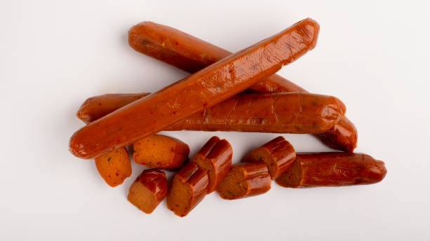 istock Meat substitute. Meatless sausage on white background 1212741447