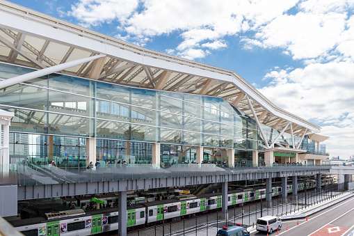 Trains and trams arriving and departing Den Haag Central station in the Netherlands