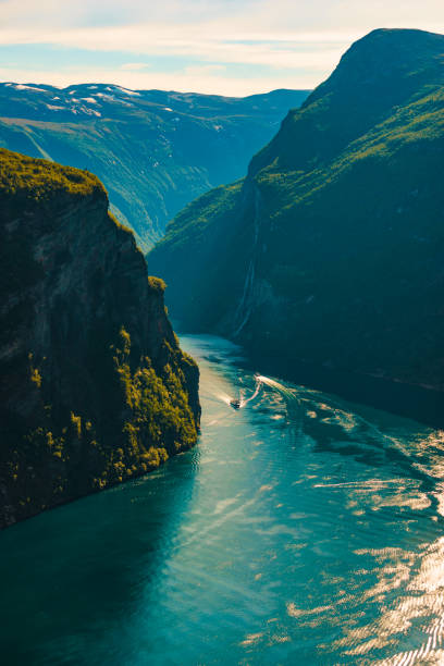 istock Fjord Geirangerfjord with ferry boat, Norway. 1212743535