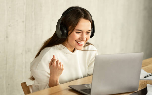 istock Young freelancer woman happy to finish work 1212744507