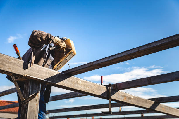 Construction Worker Welding Roof stock photo