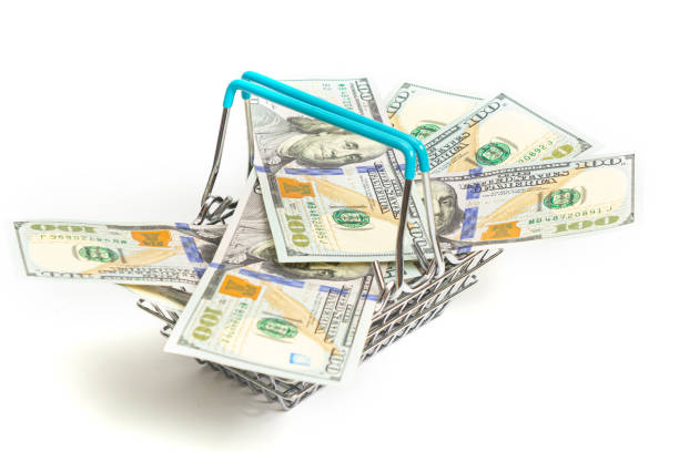 istock a basket with blue inserts is inserted into the wrapped one hundred dollar bills on a white background. isolate 1212748191