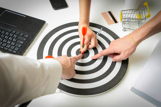 Businesspeople point ideas and cooperation a teamwork will goals lead to success.