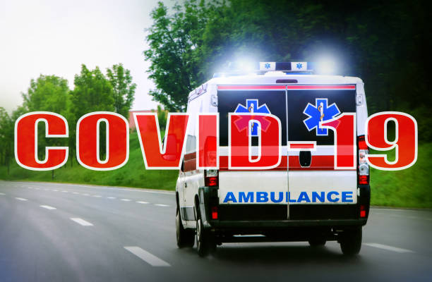 istock Ambulance van with flashing lights, corona virus 1212750274