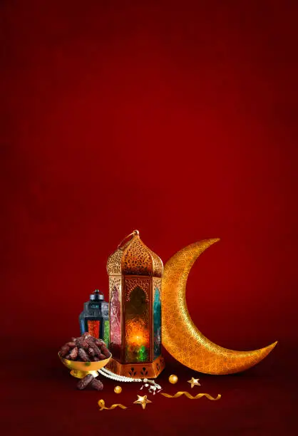 Ramadan and Eid concept light cream color new background with dates and arabic traditional lantern Light Lamp