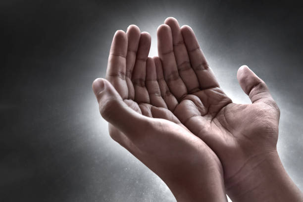 istock Hands of muslim man praying 1212750664