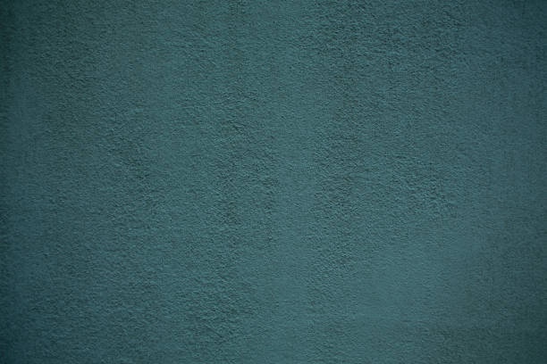 istock Green wall old paint background texture of plaster and grey cement 1212754106