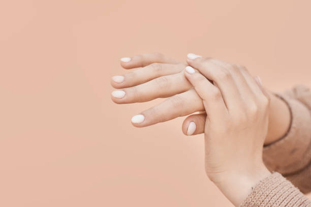 istock Woman hands showing beautiful manicure 1212755220