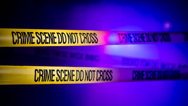 istock Yellow ribbons protect the crime scene 1212755255