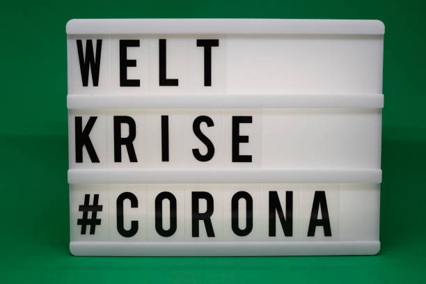 istock a light box with the inscription: WORLD KRISE #CORONA 1212755400