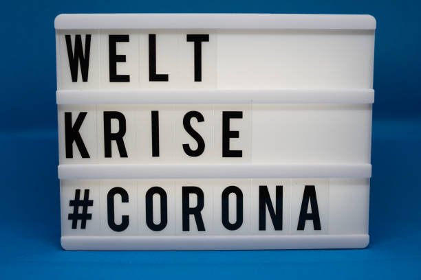 istock a light box with the inscription: WORLD KRISE #CORONA 1212755413
