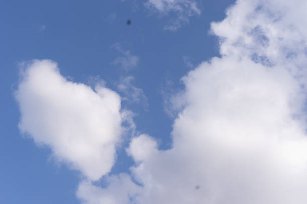 istock background of blue sky and white clouds 1212756942