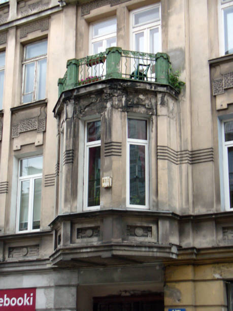 istock decorative window building on grey wall with balcony green balustrade tarace 1212756959