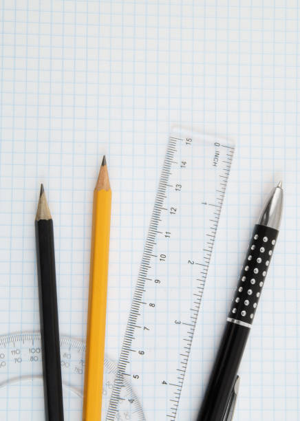 istock Office supplies on blank paper page 1212758280