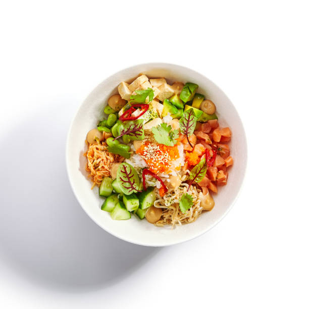 istock Poke with salmon, cut avocado and tofu top view 1212759001