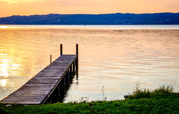 istock old wooden jetty at a lake 1212761531
