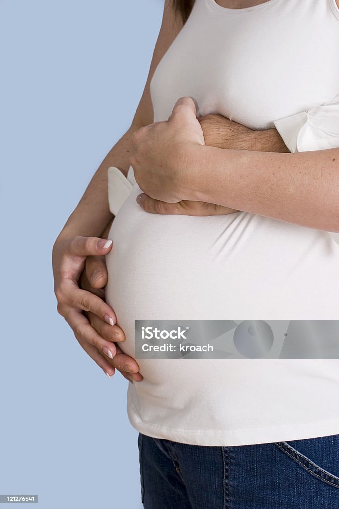 Expecting Mother  with  father hands  Adult Stock Photo