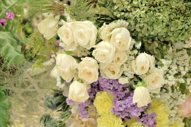 istock bouquet of white roses 1212767923