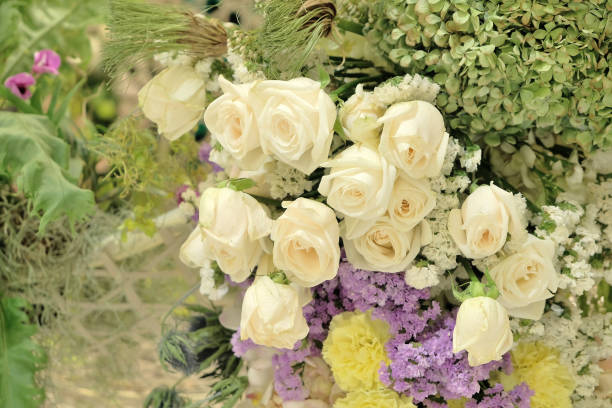 istock bouquet of white roses 1212768112