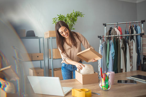 istock Woman working at home, selling items online 1212769948