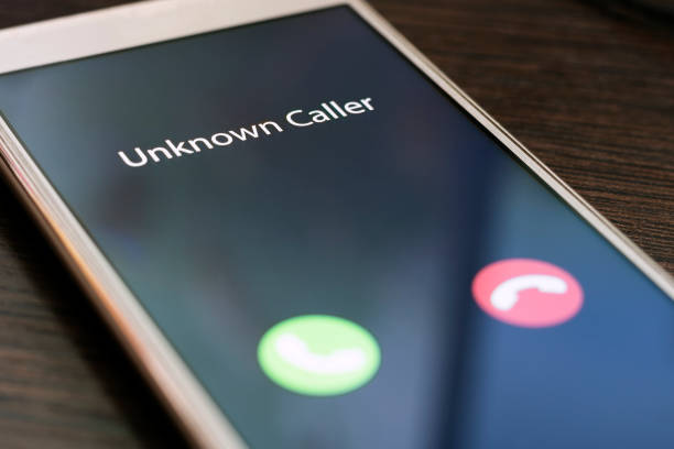 istock Unknown caller. Smartphone with incoming call from an unknown number at night. Incognito or anonymous 1212770064