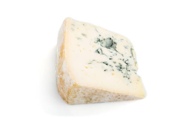 istock Piece of blue cheese isolated on white background. Side view, close up. 1212773203