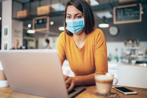 istock Woman with face protective mask 1212773712