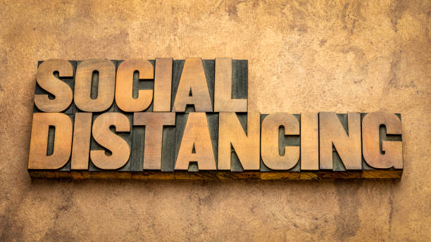 social distancing word abstract in wood type social distancing word abstract in vintage letterpress wood type - a set of nonpharmaceutical infection control actions to stop or slow down the spread of a contagious disease. printing block photos stock pictures, royalty-free photos & images