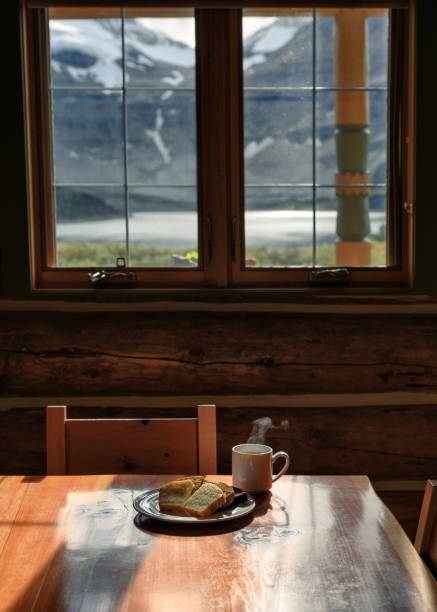 istock Served slice bread with hot espresso in a cup on  wooden lodge 1212775330