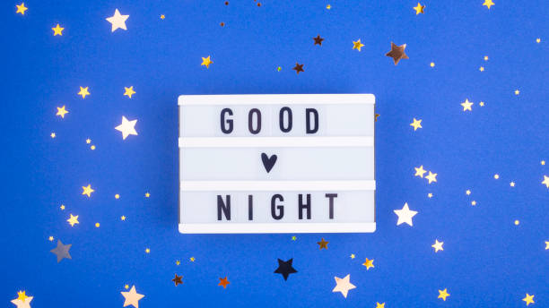 istock Healthy sleep concept - good night inscription on blue. 1212779698