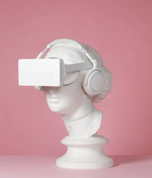 Photo of Greek Goddess wearing headphones and VR headset