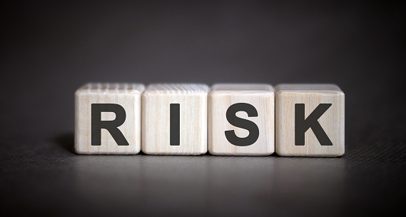 RISK - financial concept on a dark background
