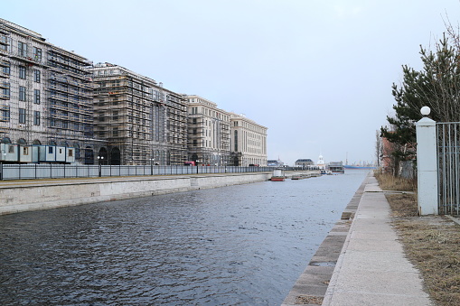urban canal with water on the outskirts of the city