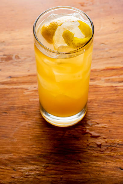 istock Cocktails. Alcoholic Drinks made with gin, vodka, rum or whiskey mixed with soda water, fruit juices and garnishes with limes and cherries. Classic American bar drinks. 1212782580