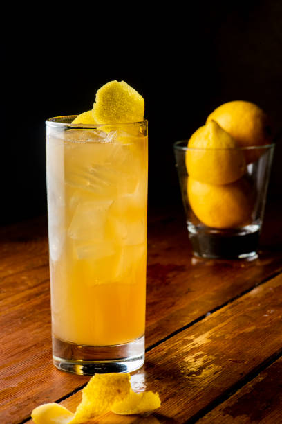 istock Cocktails. Alcoholic Drinks made with gin, vodka, rum or whiskey mixed with soda water, fruit juices and garnishes with limes and cherries. Classic American bar drinks. 1212782723