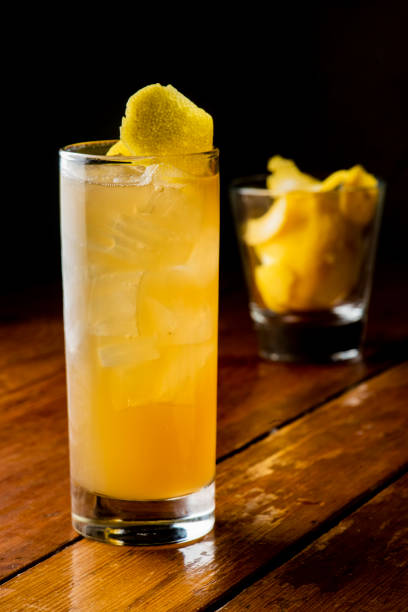 istock Cocktails. Alcoholic Drinks made with gin, vodka, rum or whiskey mixed with soda water, fruit juices and garnishes with limes and cherries. Classic American bar drinks. 1212782774