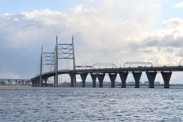 istock Seascape on a sunny evening with a large bridge 1212782919
